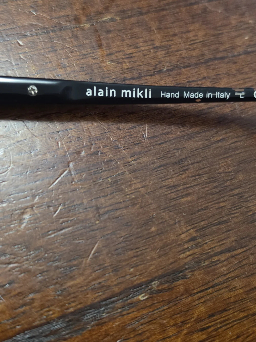 alain mikli (Model A03037) Women's Semi-Transparent Black Cat-Eye Glasses